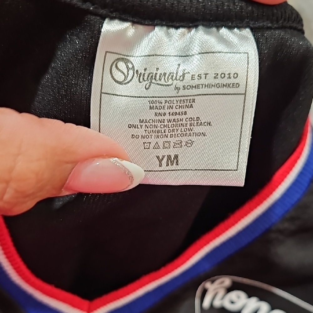 Kids Black Basketball Jersey with Red and Blue Accents - Picture 5 of 7
